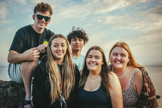 five people near outdoor during daytime